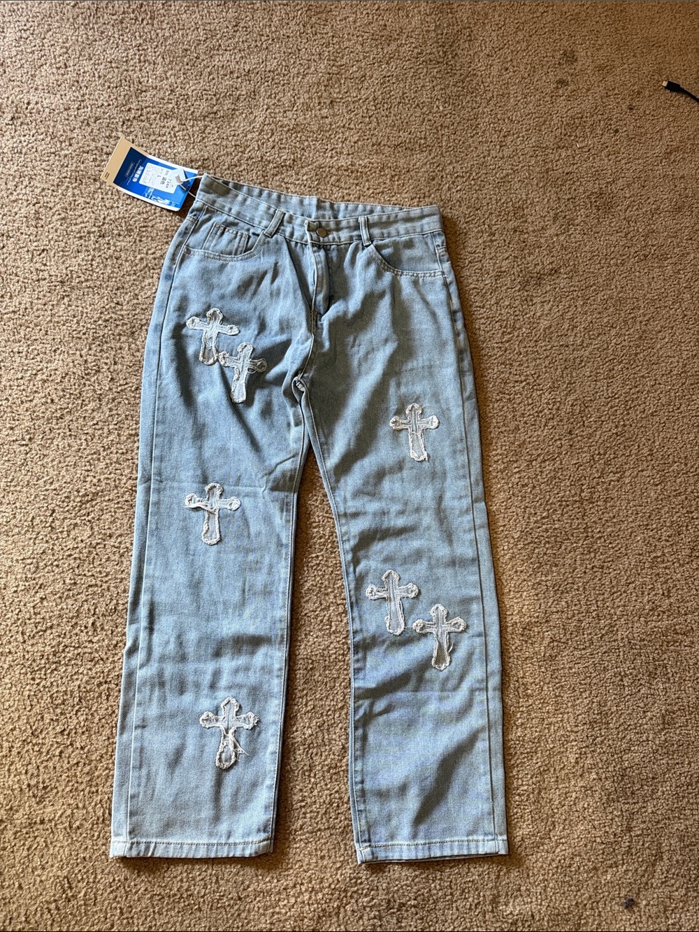 Light Blue Denim Jeans with Cross Appliqués
